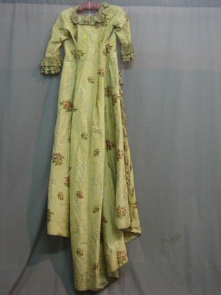 An 18th/19th Century silk dress with embroidered decoration
