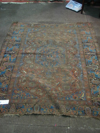 A 19th Century Caucasian rug (heavily worn) 72" x 59"