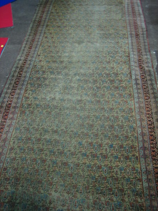 A Caucasian rug with all-over Paisley design 129" x 57"