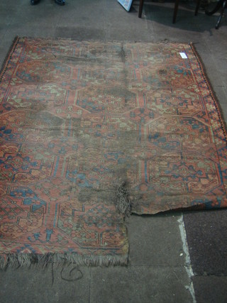 An Eastern rug (heavily worn) 76" x 68"