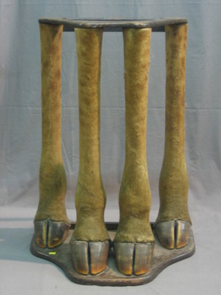A camel leg stick stand by Roland Ward, the base with Roland Ward label