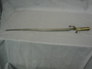 A French chassepot bayonet with brass grip, the blade dated 1871