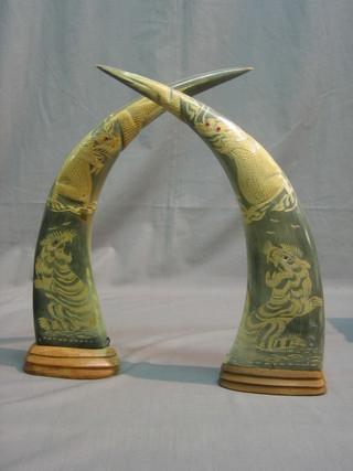 A pair of Eastern carved horns decorated tigers 17"