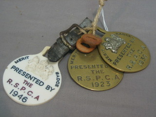 A 1923 RSPCA Merrit badge award (f), 1 other 1930' and a plastic ditto 1946