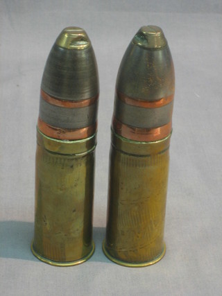 A pair of WWI shells complete with nose cones 6"
