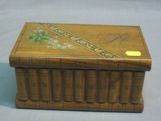 An olive wood trinket box in the form of a book with hinged lid 9"