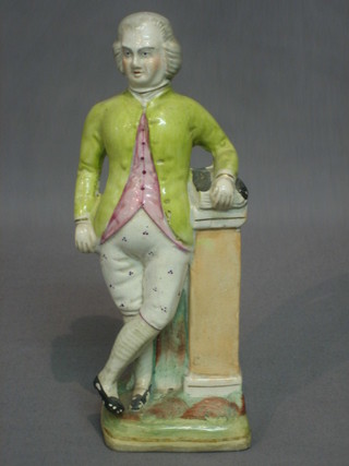 An 18th/19th Century Staffordshire figure of a standing gentleman by a column 8"
