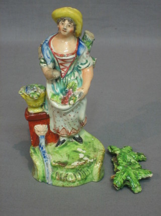 An 18th Century Staffordshire arbour figure of a standing lady 6" (f)