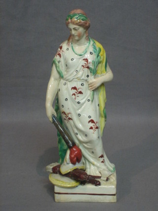 An 18th Century Staffordshire figure of a standing lady depicting Education (f and r) 8"