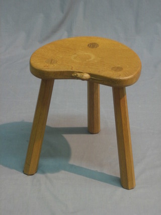 A carved honey oak Mouseman 3 legged stool 12"