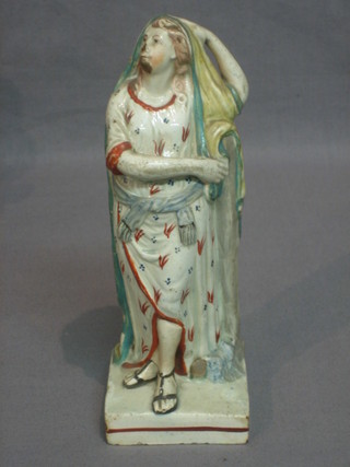 An 18th Century Staffordshire figure of a standing lady with cornucopia (heavily f and r)  9 1/2"