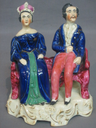 A Staffordshire seated figure group of Victoria and Albert 7" 