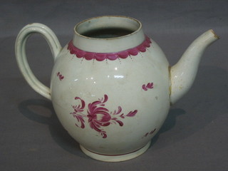 An 18th Century teapot with puce decoration (crack to base) 5"