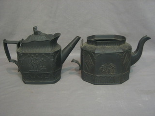 A 19th Century lozenge shaped black basalt shaped teapot decorated figures (handle f) no lid, 9" and 1 other decorated classical scenes (chip to rim)