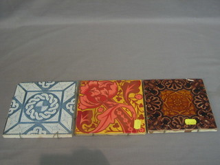 A Victorian Minton brown glazed tile 6", a blue and white tile and a lustre tile