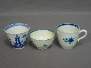 A Worcester Oriental style blue and white tea bowl (f and r) and a blue and white coffee can