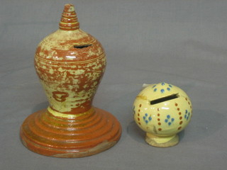 A Whieldon style mushroom shaped money box 3" and 1 other standing pottery money box 6"