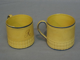 A pair 19th Century Creamware mugs marked B (both cracked)