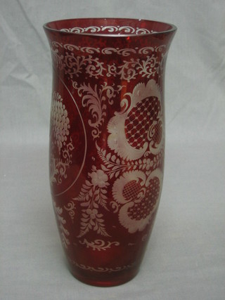 A Bohemian red overlay glass vase decorated an urn of flowers 10"