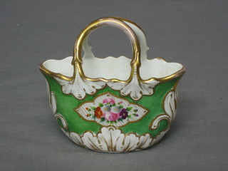 A Continental porcelain bag shaped vase with green ground and floral and pink decoration (crack to back) 5"