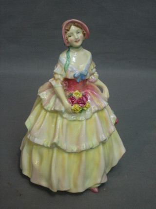A Royal Doulton figure Irene (crack to head)