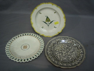 An 18th Century pottery plate decorated flowers within a yellow rim 8", a lustre plate and a ribbon ware plate (3)