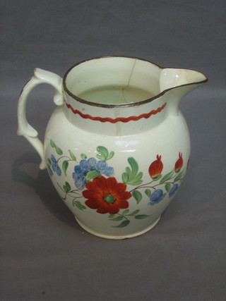 An 18th Century Welsh style pottery jug with floral decoration 6" (cracked)