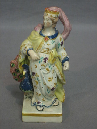 A 19th Century Staffordshire figure of a noble lady with peacock 6"