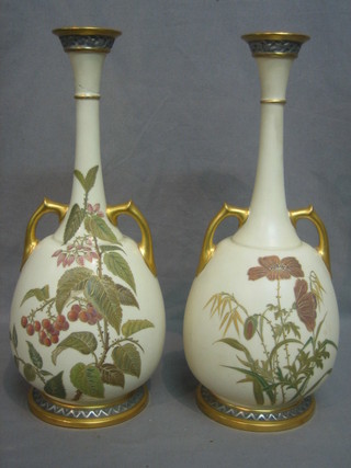 A pair of Victorian Royal Worcester blush ivory twin handled club shaped vases, the base purple Worcester mark and impressed 857 14" (1 f and r)
