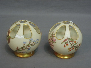 A pair of Worcester circular pot pouri vases with blue ivory ground and floral decoration, base with purple Worcester mark RD956 and marked 991 3" (1f)