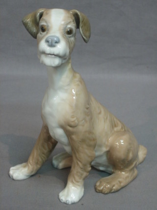 A Lladro figure of a seated dog, base incised 27, 7"