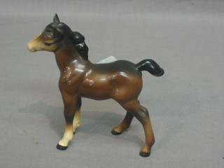 A Beswick figure of a standing bay foal 4"