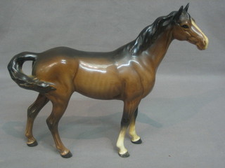 A Beswick figure of a standing bay horse 9"