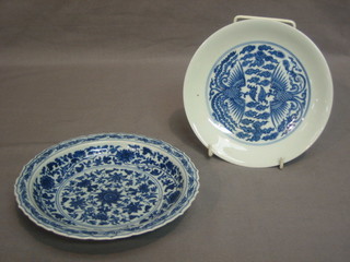 An Oriental dish with blue and white floral decoration 6" and 1 other decorated birds 6", both with 6 character figure mark to base