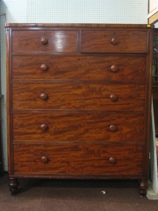 A large Victorian mahogany D shaped chest with crossbanded top, fitted 2 short and 4 long drawers, raised on bun feet 49"