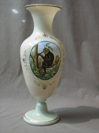 A 19th Century opaque glass vase decorated a seated monkey 15 1/2"