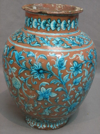An Isnic style pottery club shaped vase (chip to base and rim) 10"