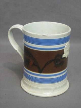 A Victorian mocha ware tankard with crowned VR cypher 6" (cracked)