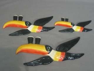 A set of 3 reproduction Guiness advertising flying Toucans