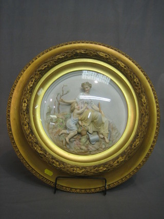 A pair of Victorian circular biscuit porcelain plaques depicting mother and child 13" contained in gilt frames with convex glazed panels