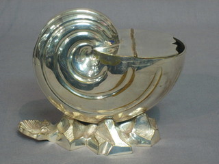A Victorian scallop shaped silver plated spoon warmer