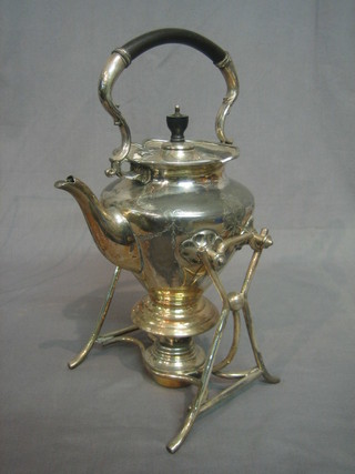 A Britannia metal tea kettle and stand complete with burner