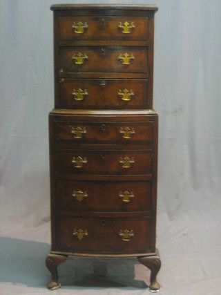 A reproduction Queen Anne style walnut miniature bow front chest on chest, the upper section fitted 3 drawers, the base fitted 4 long drawers, raised on cabriole supports 16 1/2"