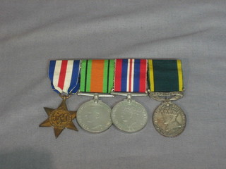 A group of 4 medals to 2088725 Gunner F V Barford Royal Artillery comprising France and Germany Star, British War medal, Victory medal and Territorial Efficiency medal