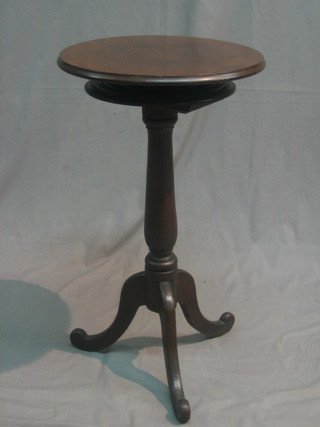A 19th Century mahogany wine table, raised on turned pillar and tripod supports (requires attention)