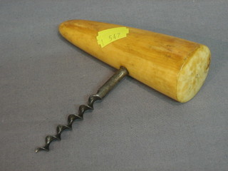 A corkscrew with ivory tusk handle