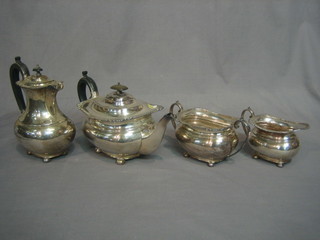 A Georgian style oval silver plated 4 piece tea service with gadrooned borders - teapot, hotwater jug, twin handled sugar bowl and milk jug