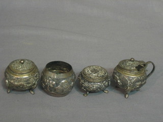 An Eastern silver mustard pot, a do. pepper pot, napkin ring and small jar and cover 