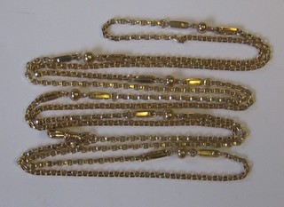 A gilt metal multi link guard chain