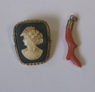 A coral set pendant together with a cameo brooch in a gilt metal mount